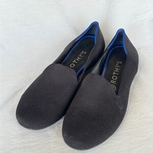 Black Rothy’s loafer style shoes